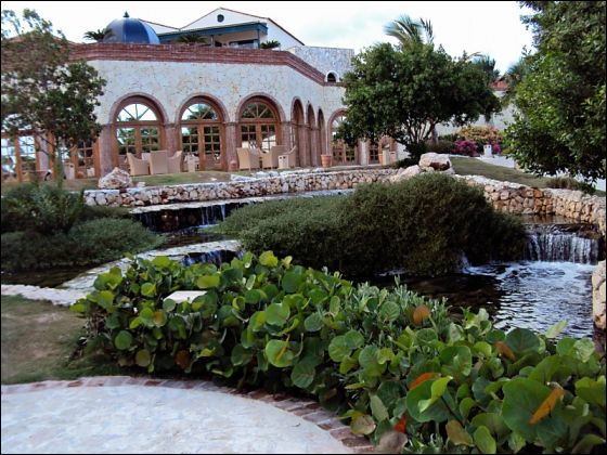 Walkway from villas passing the gardens to lobby at Secrets Sanctuary Cap Cana
